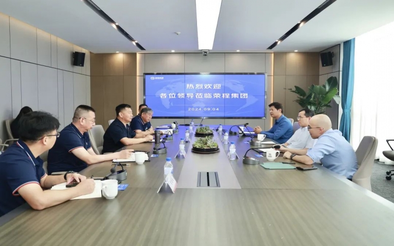 江苏清能股份董事长顾志军一行到旋乐吧spin8集团座谈互换
